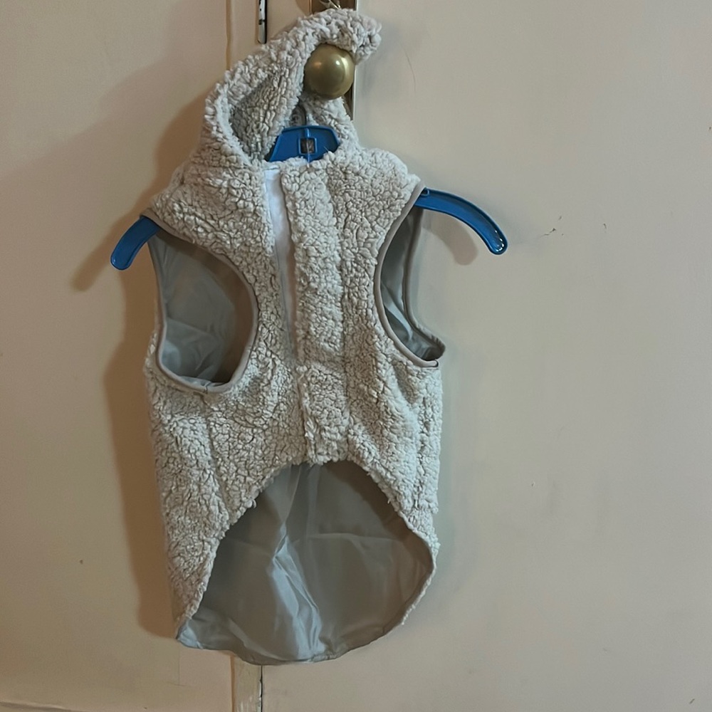 This is a brand NEW doggie coat, just tried on my dog but it did not fit.